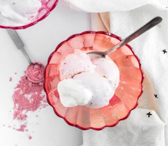 Small bowl of vegan pomegranate strawberry sorbet.