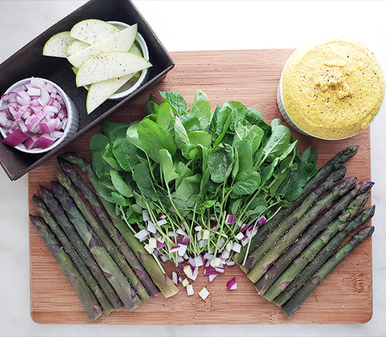 Spread of veggies with a turmeric cashew dipping sauce made with Navitas Organics Turmeric Powder