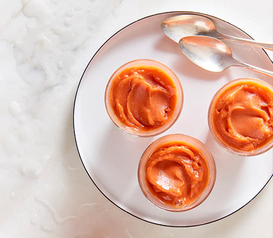 Three dishes of pink strawberry sorbet made with Navitas Organics Goji Berries