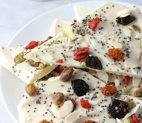 Vegan white chocolate bark made with Navitas Organics goldenberries, goji berries and hemp seeds