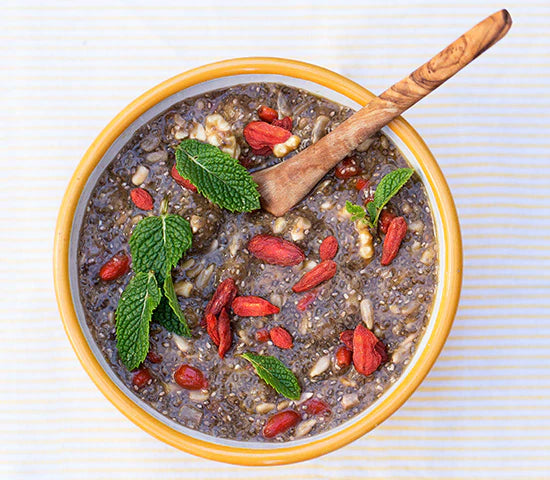 Chia pudding bowl with goji berries, mulberries, walnuts and sunflower seeds