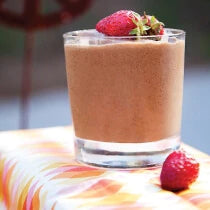 Chocolate smoothie topped with strawberries