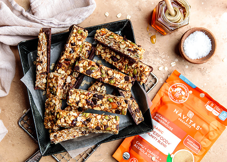 Superfood granola bars made with Navitas Organics Superfood+ Immunity Blend, Hemp Seeds and Chia Seeds, on a baking sheet