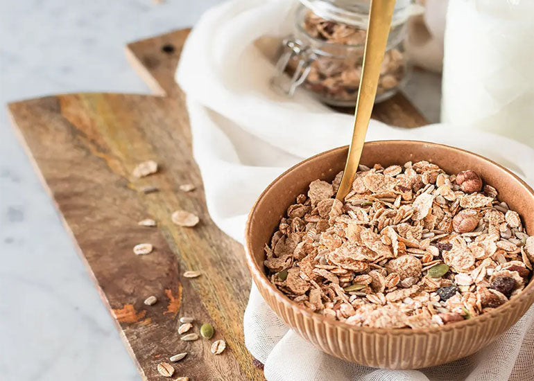 A bowl of superfood oats made with Navitas Organics Maca Powder, Goldenberries and Cacao Nibs