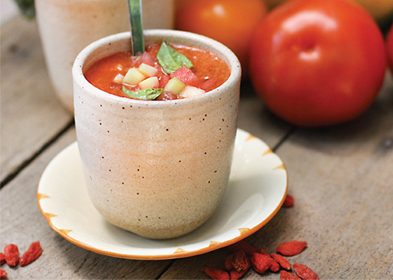 A cup full of watermelon goji gazpacho made with Navitas Organics Goji Berries