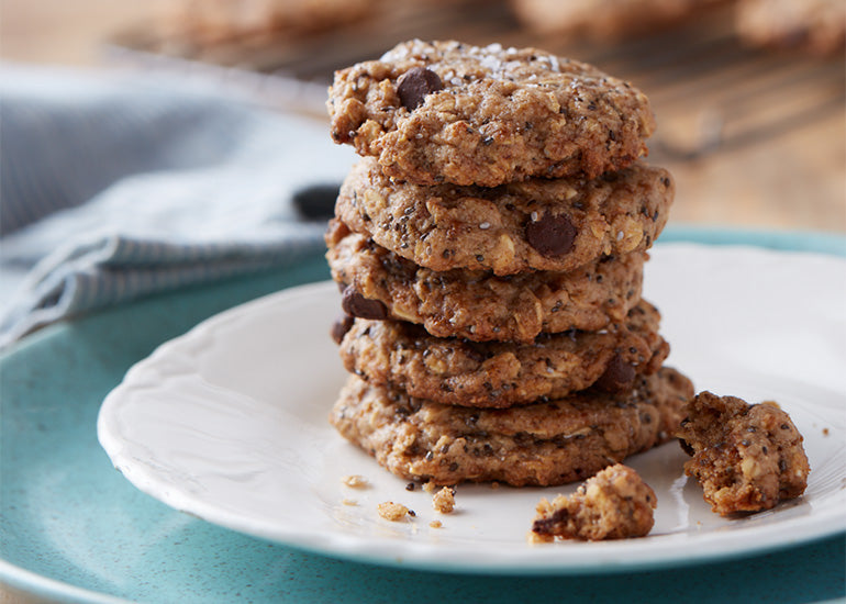 A stack of chocolate chip chia cookies made with Navitas Organics Chia Powder and Chia Seeds on a plate.