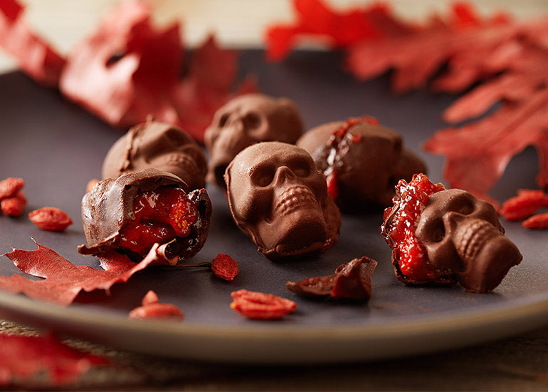 Skull-shaped chocolates filled with a jam made with Navitas Organics Goji Berries.