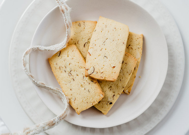A plate of mulberry oat shortbread cookies made with Navitas Organics Mulberries.
