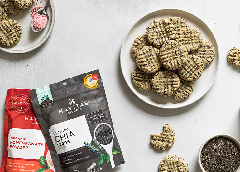 A plate of almond chia seed cookies made with Navitas Organics Chia Seeds and Pomegranate Powder.