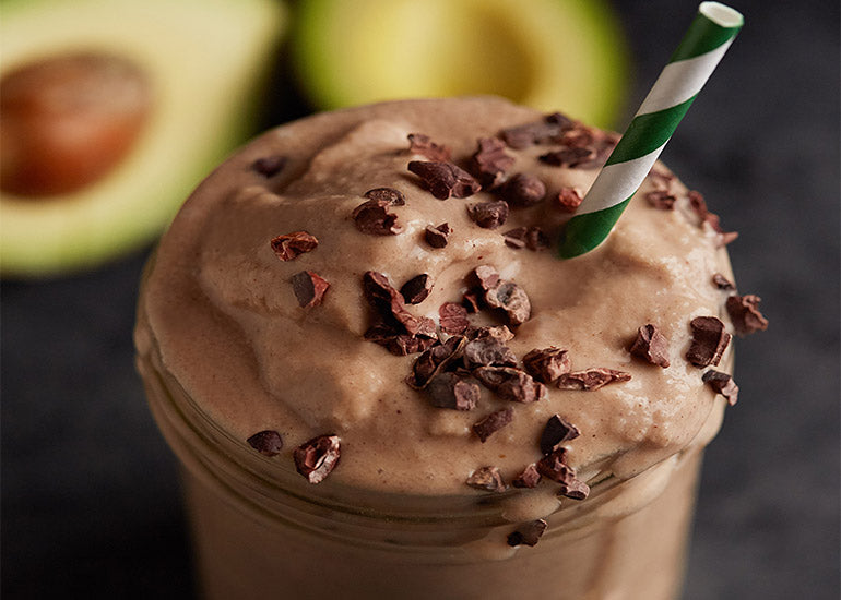 Thick chocolate smoothie made with Navitas Organics Cacao Powder and Cacao Nibs
