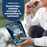 Person holding a package of Navitas Organics Superfood+ Blueberry Hemp BITES with text about its uses.