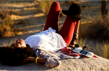 A lady relaxing outdoors