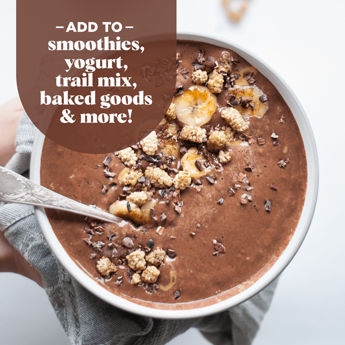 ADD TO: smoothies, yogurt, trail mix, baked goods & more! Cacao smoothie bowl with a spoon with Navitas Cacao Nibs