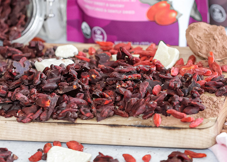 Chocolate covered goji berries made with Navitas Organics Cacao Powder, Cacao Butter, Cacao Sweet Nibs and Goji Berries