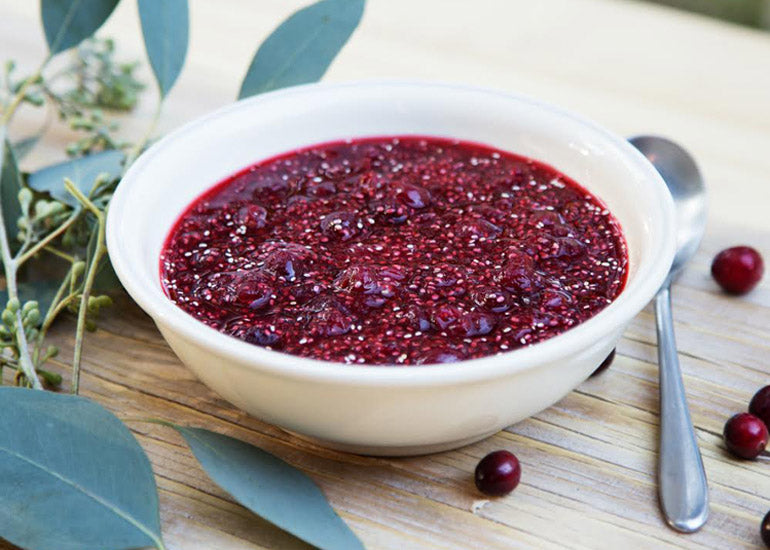 A bowl filled with a chia cranberry sauce made with Navitas Organics Chia Seeds and Goji Berries.