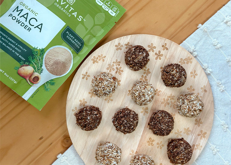 A board topped with a variety of macaroons made with Navitas Organics Maca Powder, Chia Seeds and Cacao Powder.