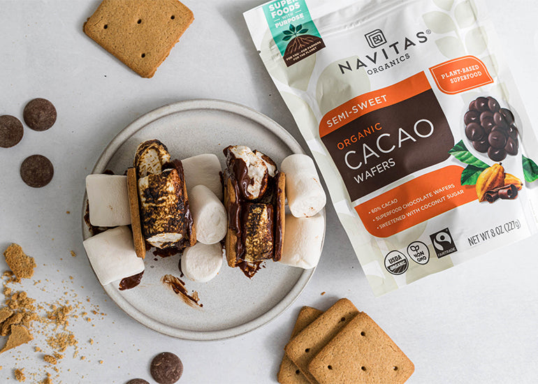 A plate topped with s'mores made with Navitas Organics Semi-sweet Cacao Wafers