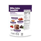 Navitas Organics Berry Acai Superfood+ Bites packaging with purple and white design on a light  background