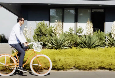 A man biking in his neighborhood