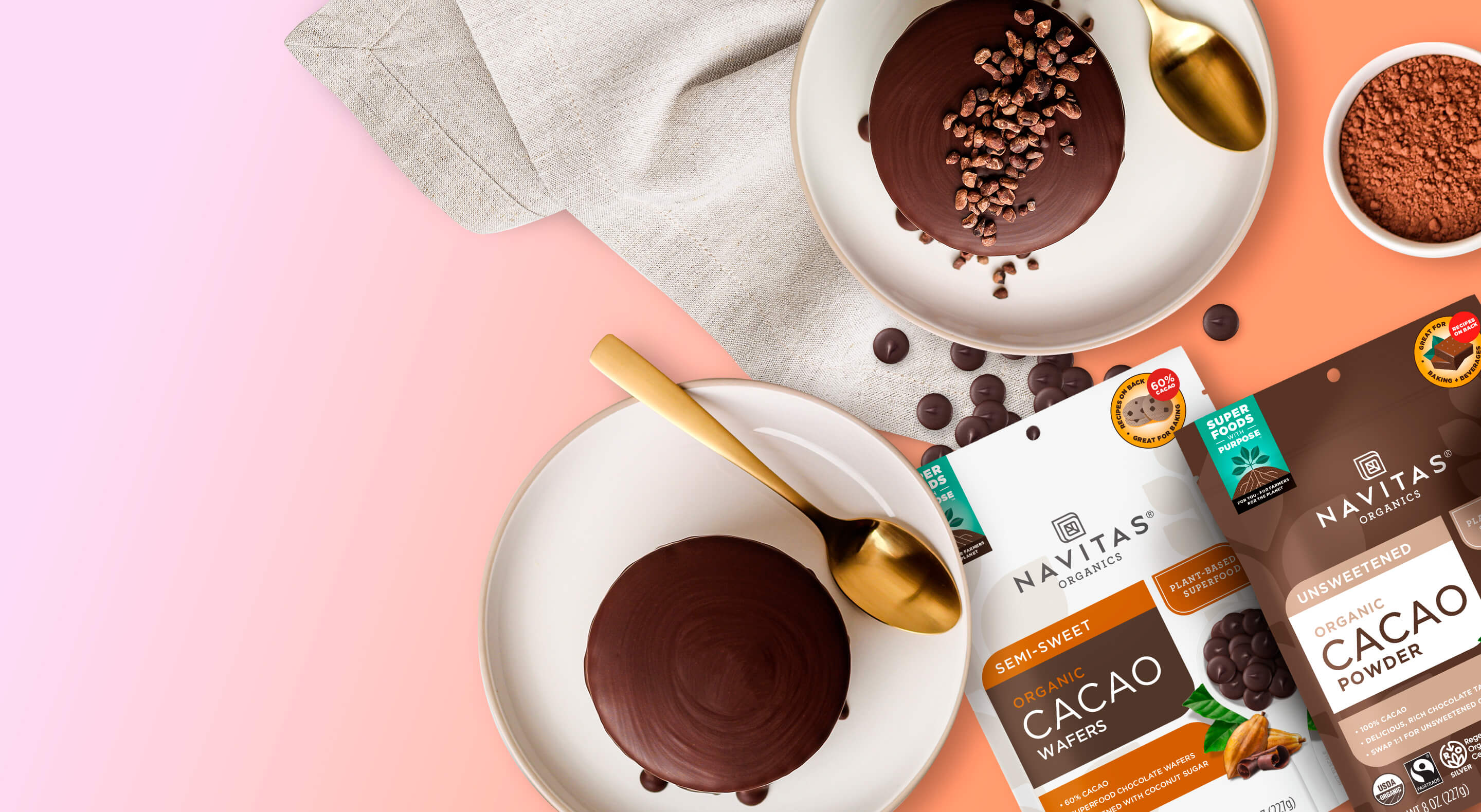 Navitas Organics Cacao Powder and Semi-sweet Cacao Wafers with chocolate desserts on a colorful background