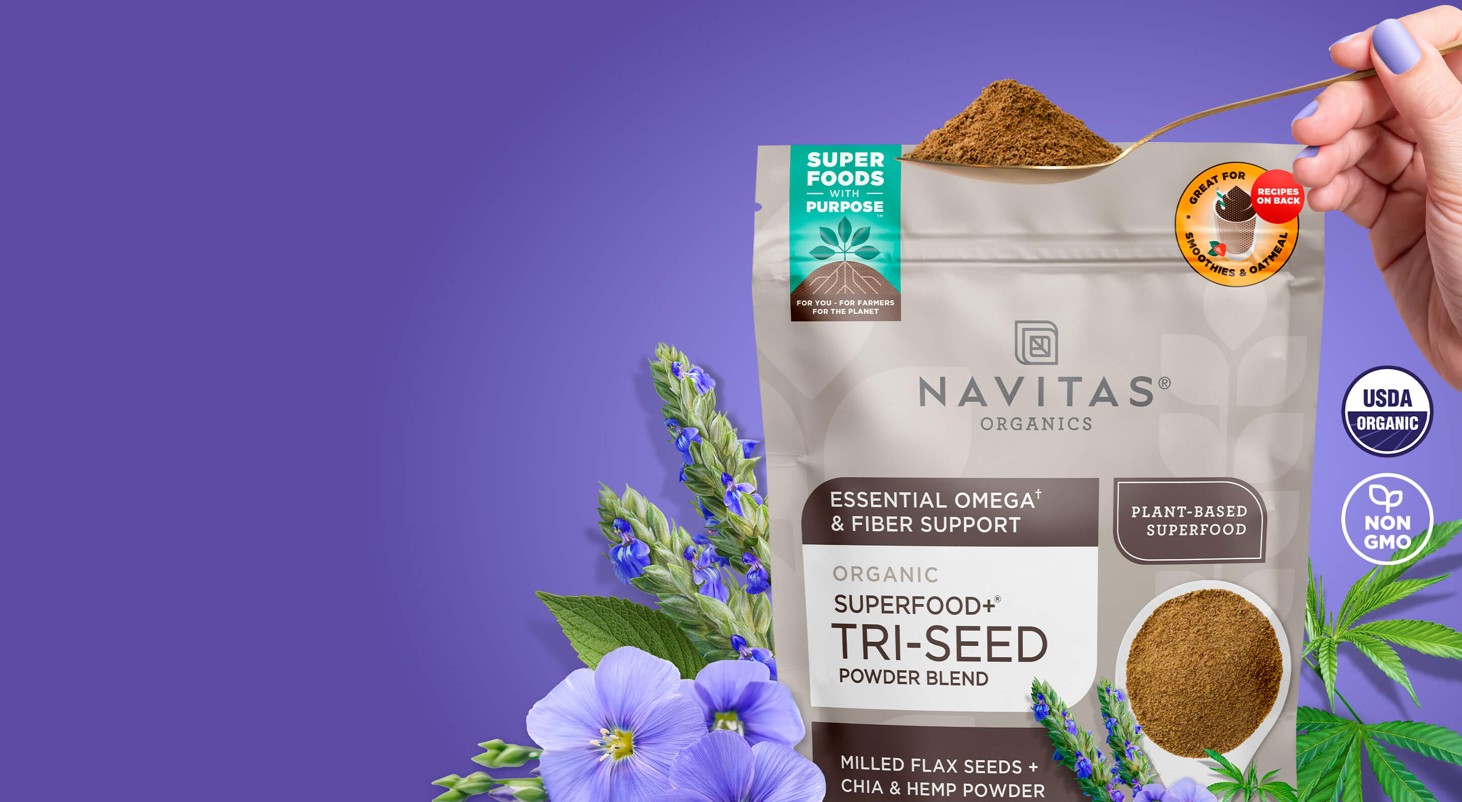 Navitas Organics Superfood+ Tri-Seed  Powder Bend with a hand holding a scoop of powder on a purple background