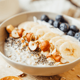 Breakfast bowl made with Navitas Chia Seeds, fresh fruit and nuts.