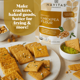 Navitas Chickpea Flour makes crackers, baked goods, batter for frying & more! Plate of homemade chickpea crackers with a bowl of guacamole and fresh chickpeas on a counter.