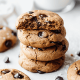 Stack of mouthwatering chocolate chip cookies made with Navitas Essential Superfood Blend Vanilla & Greens.